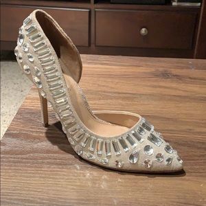 A pair of lightly worn Steve Madden shoes.